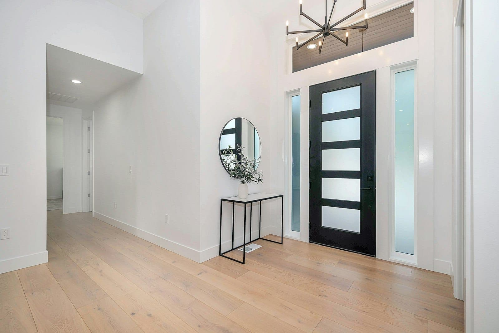 Custom sliding wood door in a styled interior