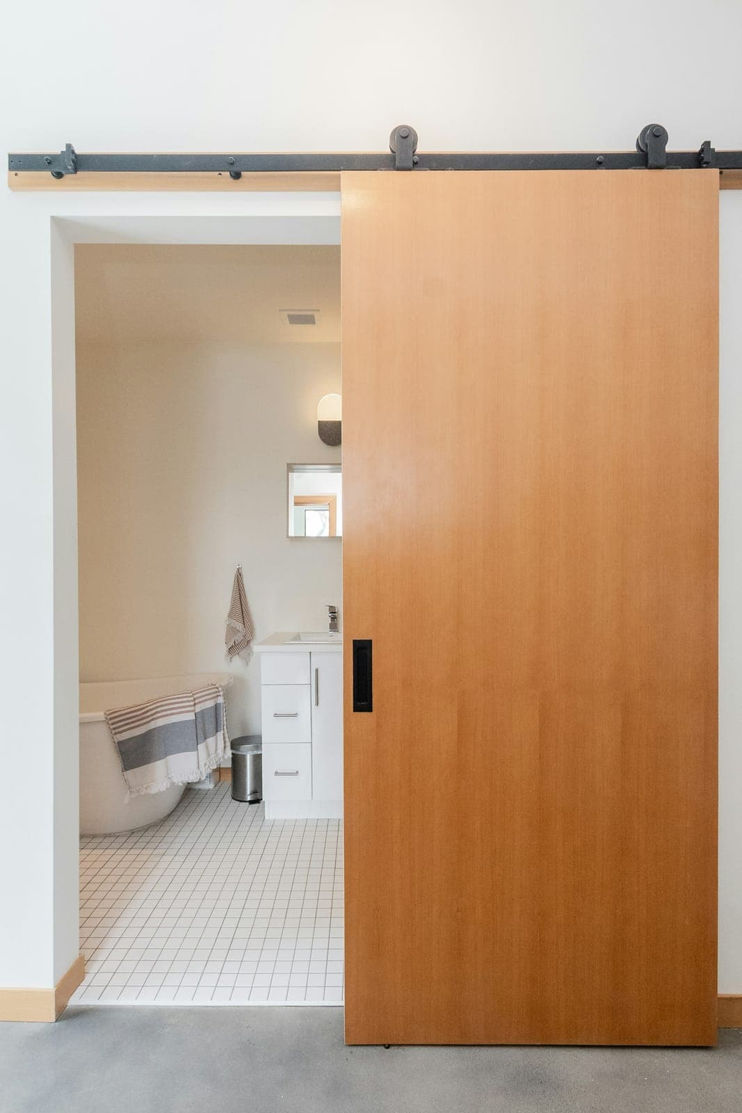 Modern glass door in a clean styled entryway